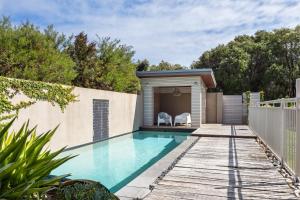 a swimming pool in the backyard of a house at Seabreeze Escape, Coastal Stay in Gnarabup