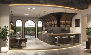 a restaurant with a bar in a room with windows at Pereira Samsun in Samsun