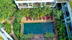 an overhead view of a swimming pool in a building at The Moon Residence & Spa in Siem Reap