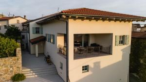 a view of a house with a balcony at Villa Sofija in Kojsko