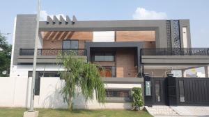 a building with a tree in front of it at AA Loft in Lahore
