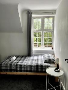 En eller flere senge i et værelse på 3 Bedroom House with Parking + 4 billeder