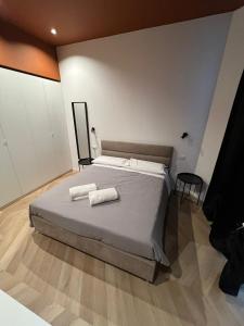 Postel nebo postele na pokoji v ubytování Residenza Mazzini + 17 fotografií