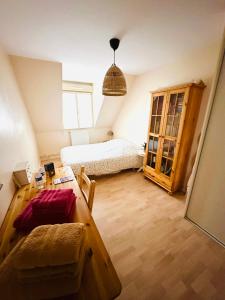 Giường trong phòng chung tại Chambres Moto GP, 24h du Mans, Le Mans Classic 2026