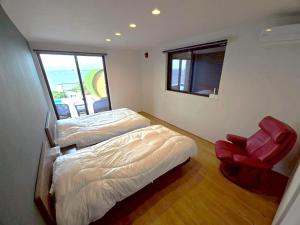 Postel nebo postele na pokoji v ubytování Villa 海と星 + 20 fotografií