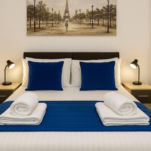 Ένα ή περισσότερα κρεβάτια σε δωμάτιο στο The Perfect Entire Rental Flat