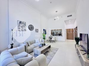 TV a/nebo společenská místnost v ubytování Bloomfields Spacious 1Br Ansam