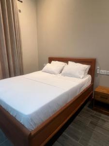 Ένα ή περισσότερα κρεβάτια σε δωμάτιο στο Evita Villas Lodge