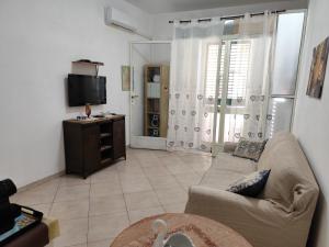Μια τηλεόραση ή/και κέντρο ψυχαγωγίας στο La Casa Di Via Marzulli
