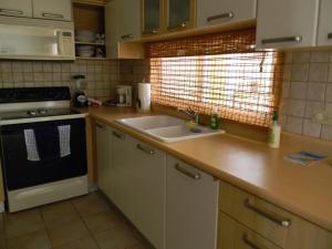 Cuisine ou kitchenette dans l'établissement Apartment Continental Beach Resort