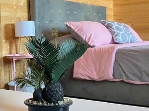 Giường trong phòng chung tại Casinha Melissa