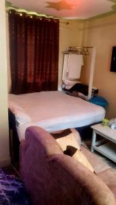Postel nebo postele na pokoji v ubytování Vivid Homes