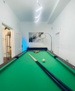 a billiard room with a green pool table at Your Exclusive Apulian Suite Near Matera in Ginosa +29 photos
