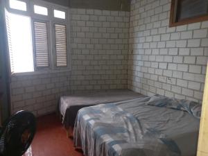 Pé na areia vista maravilhosa!房間的床 +11 張相片