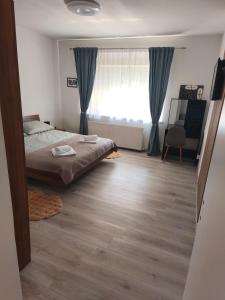 Ένα ή περισσότερα κρεβάτια σε δωμάτιο στο Apartman Relax +21 φωτογραφίες