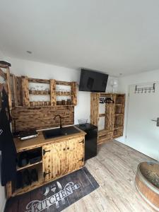 TV a/nebo společenská místnost v ubytování Fewo Möösini am Kanonenberg