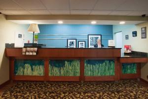 a lobby with a large aquarium in a room at Baymont by Wyndham Thornton in Thornton