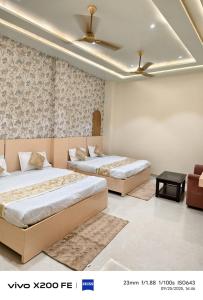 Katil atau katil-katil dalam bilik di Knightz Bridge Hotel