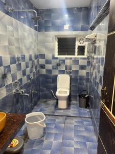 Ένα μπάνιο στο Aanandha Inn