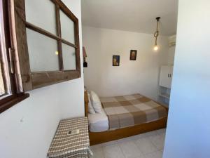 Ένα ή περισσότερα κρεβάτια σε δωμάτιο στο A private room by the rooftop