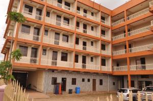 an external view of an apartment building at Okura Hotel in Gulu