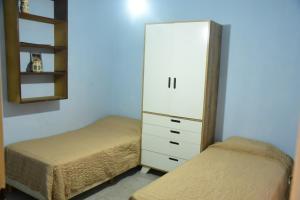 Postel nebo postele na pokoji v ubytování La Casita + 2 fotografie