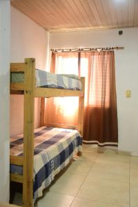 Postel nebo postele na pokoji v ubytování La Casita