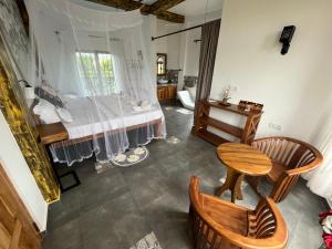 Ένα ή περισσότερα κρεβάτια σε δωμάτιο στο Dune Towers