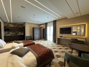 Μια τηλεόραση ή/και κέντρο ψυχαγωγίας στο Venicia Hotel فندق فينيسيا