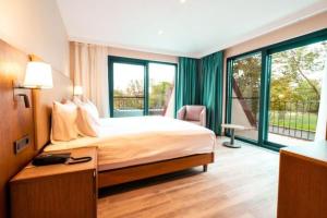 Postel nebo postele na pokoji v ubytování Wellwood Otel + 4 fotografie