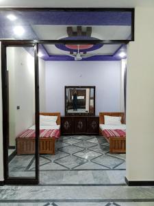 Ένα ή περισσότερα κρεβάτια σε δωμάτιο στο Red Roof Apartments