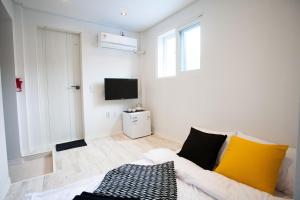 TV a/nebo společenská místnost v ubytování Daemyung Guesthouse