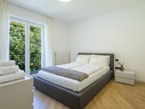 Postel nebo postele na pokoji v ubytování Holiday Home Civico 16 Garden Home by Interhome