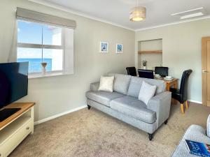 TV a/nebo společenská místnost v ubytování Sunset Cottage - Uk35815