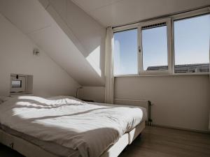 Ένα ή περισσότερα κρεβάτια σε δωμάτιο στο Apartment Oostergeest 2 by Interhome +23 φωτογραφίες