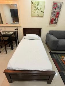 Katil atau katil-katil dalam bilik di Taragon Puteri Bintang KLCC View Studio Apartment