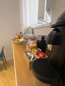 a kitchen with a counter with a coffee machine at Cielo B&B in Crotone