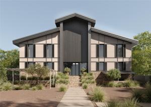 een huis met een zwart-witte gevel bij Hills Hotel in Karakol