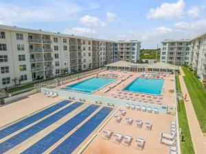 Kolam renang di atau dekat dengan Beautiful 1bd 1ba Condo in New Smyrna Beach