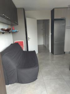 Posezení v ubytování Appartement studio vue sur la Marina + 1 fotografie