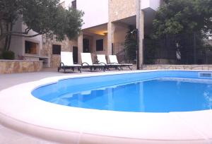 Πισίνα στο ή κοντά στο Holiday Home Jakasa