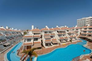 an aerial view of a resort with a swimming pool at Las Floritas in Playa de las Americas