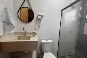 Koupelna v ubytování Moderno Loft com ar condicionado e vaga + 28 fotografií