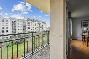 En balkon eller terrasse på Appartement de la Coulée - Welkeys