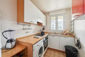 Køkken eller tekøkken på Appartement de la Coulée - Welkeys