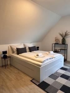 Ένα ή περισσότερα κρεβάτια σε δωμάτιο στο Livoro Apartments +11 φωτογραφίες