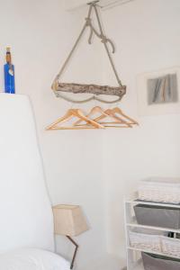 a shelf hanging on a wall in a room at Isla privada, Menorca in Fornells +26 photos