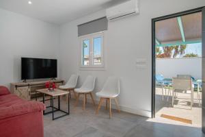 TV a/nebo společenská místnost v ubytování Casa Verde agua