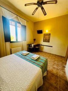 Ένα ή περισσότερα κρεβάτια σε δωμάτιο στο Villa Aemilius Boutique Rural