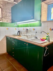 Kuchyň nebo kuchyňský kout v ubytování Cornaro House